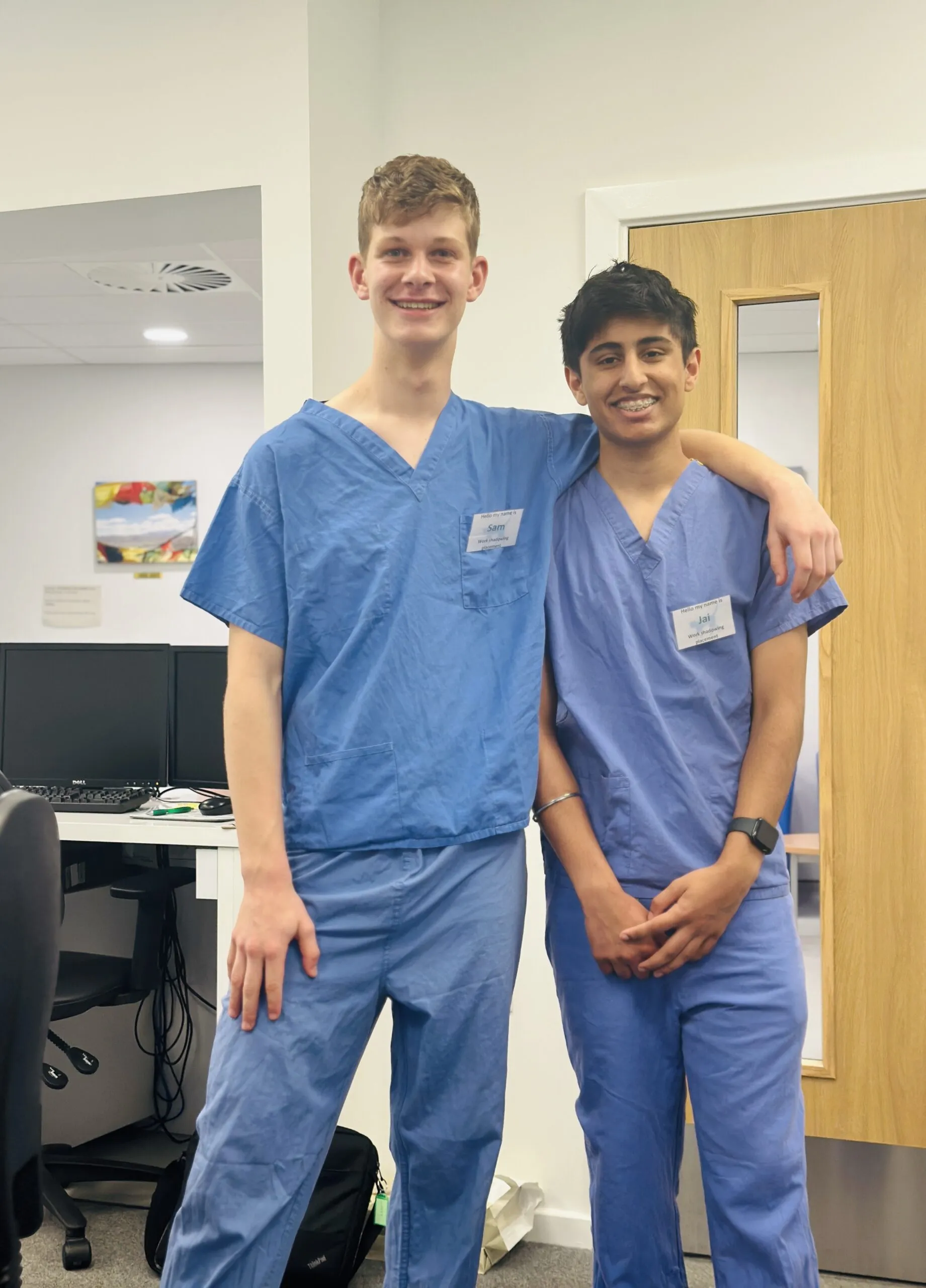 Samuel Korenberg in clinical scrubs during NHS work experience